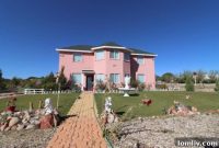 This Bob Ross Fans House Is a Masterpiece of Mayhem