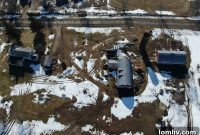 A Wisconsin Farmhouse Forged from Weathered Wood and Exposed Steel