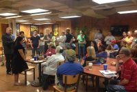 East Village Showdown: Residents Don Red Tonight, Demand 30-Day Sam’s Club Delay