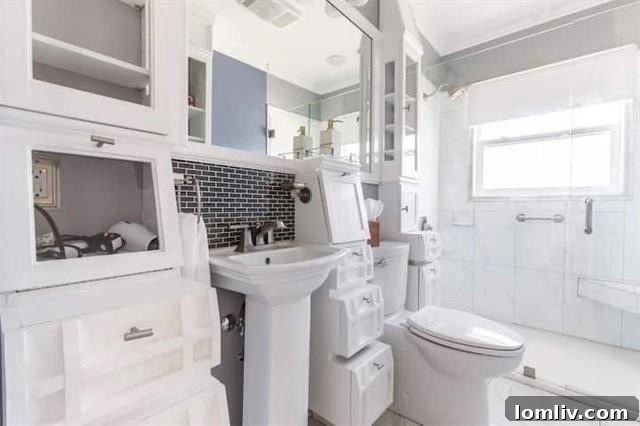 Another angle of the modern kitchen in the updated unit, highlighting the sleek design and functional layout.