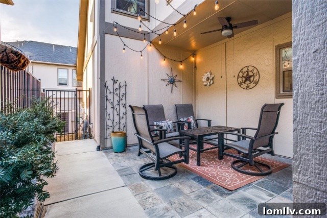 $375K Dilemma Oak Lawn Townhome or McKinney Condo 11 A modern bathroom with a split vanity in the McKinney townhome, featuring contemporary fixtures and ample counter space.