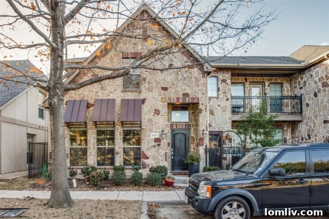 $375K Dilemma Oak Lawn Townhome or McKinney Condo 3 A charming townhome exterior with well-maintained landscaping, situated on Trolley Trail in McKinney, suggesting suburban comfort.
