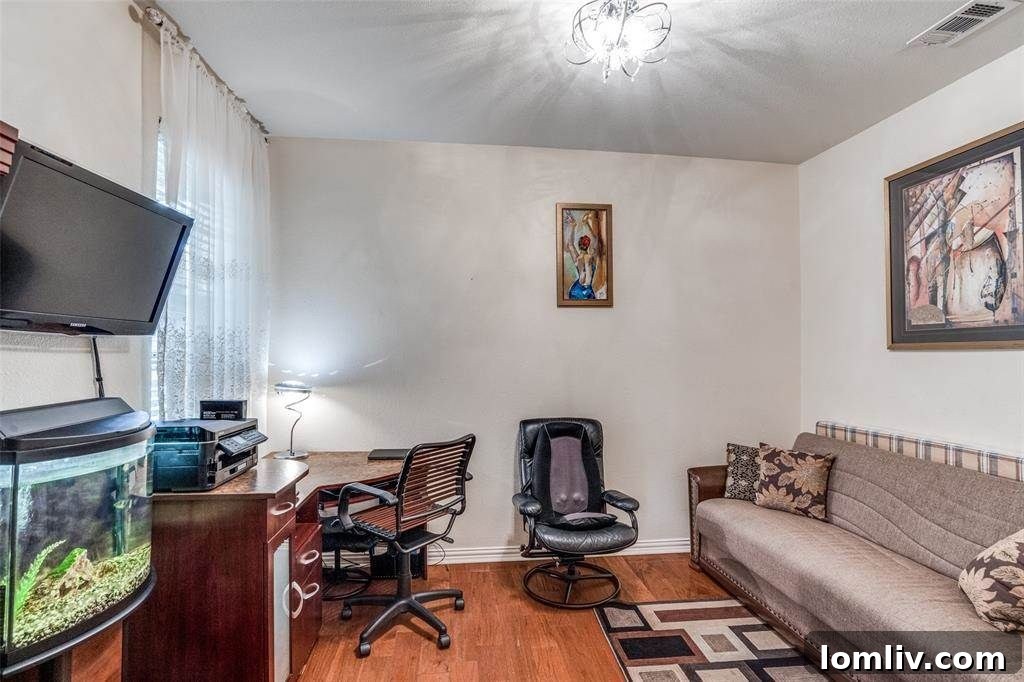 Luxurious primary bathroom with a garden tub, separate shower, dual vanities, and elegant tilework