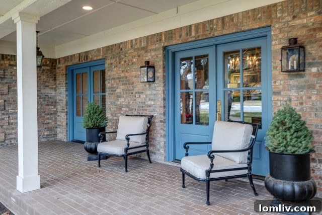 Westcliff Home on Ranier Court: Stunningly Remodeled for Ideal Living 3 Twin double doors leading to a welcoming front porch of a Westcliff home