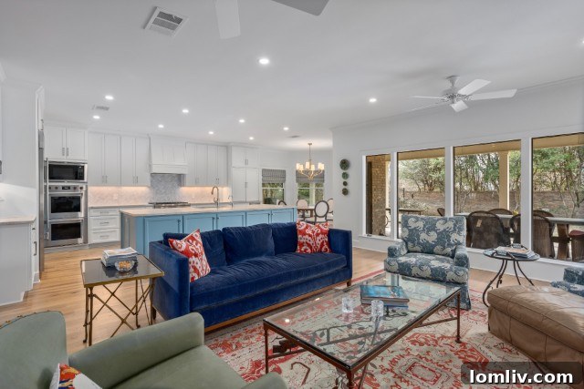 Westcliff Home on Ranier Court: Stunningly Remodeled for Ideal Living 6 Inviting family room flowing into a custom kitchen with large windows in a Fort Worth home