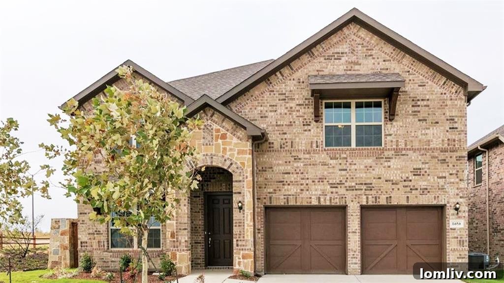 Spacious kitchen with large island, stainless steel appliances, and ample counter space.