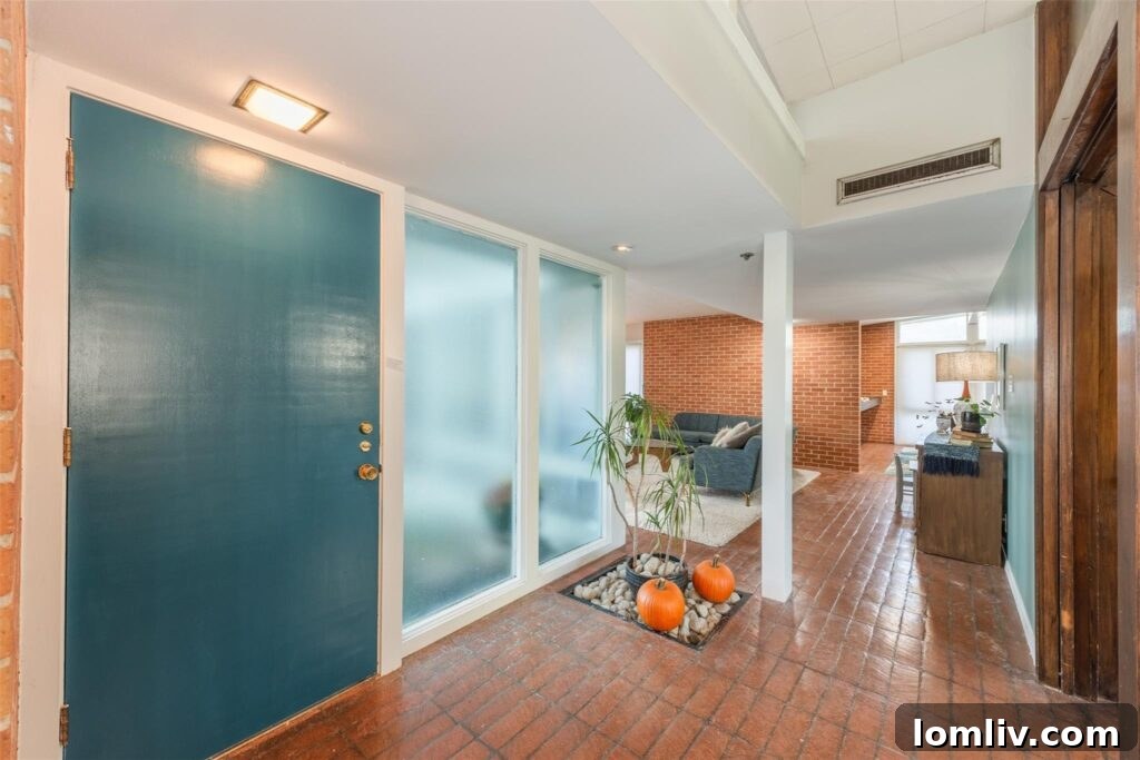Spacious Midcentury Modern Living Area with Terracotta Floors