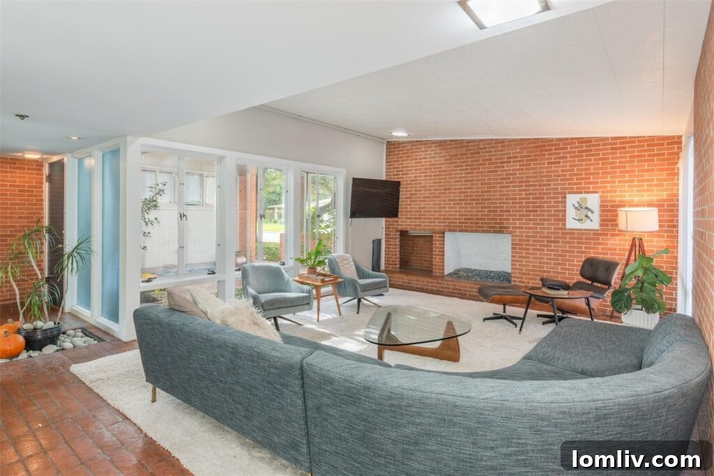 Elegant Midcentury Modern Living Room with Blue Sofa and Noguchi Table
