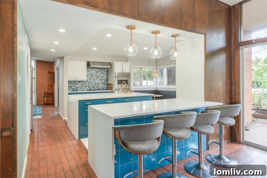 Bright Midcentury Modern Dining Room with Blue Accents