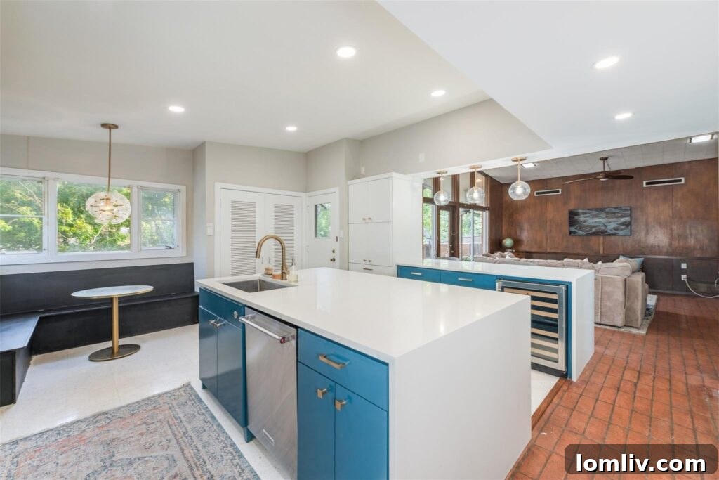 Modern Renovated Kitchen with Dual Islands and Quartz Countertops