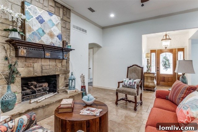A bright and airy living space inside the home, showcasing modern furnishings and ample natural light.