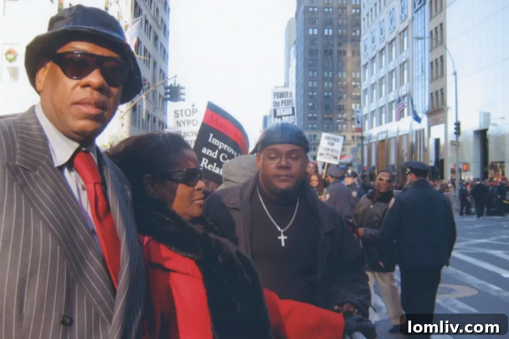 Talley protesting police brutality with members of the Abyssinian Baptist church in 2006.