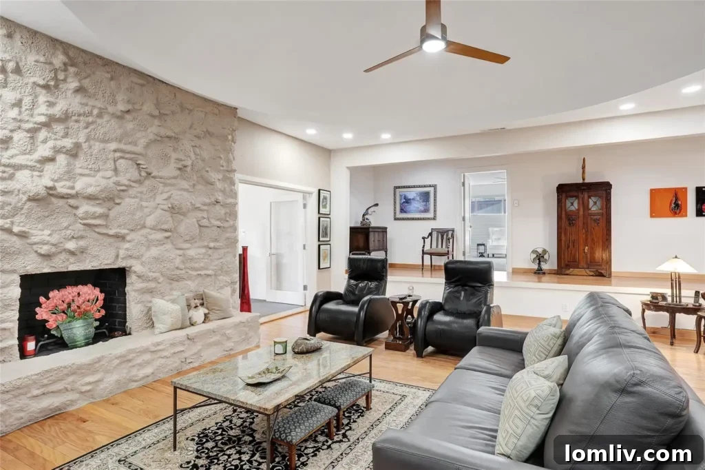 A detailed shot of one of the stunning fireplaces, a focal point in the sophisticated living space.