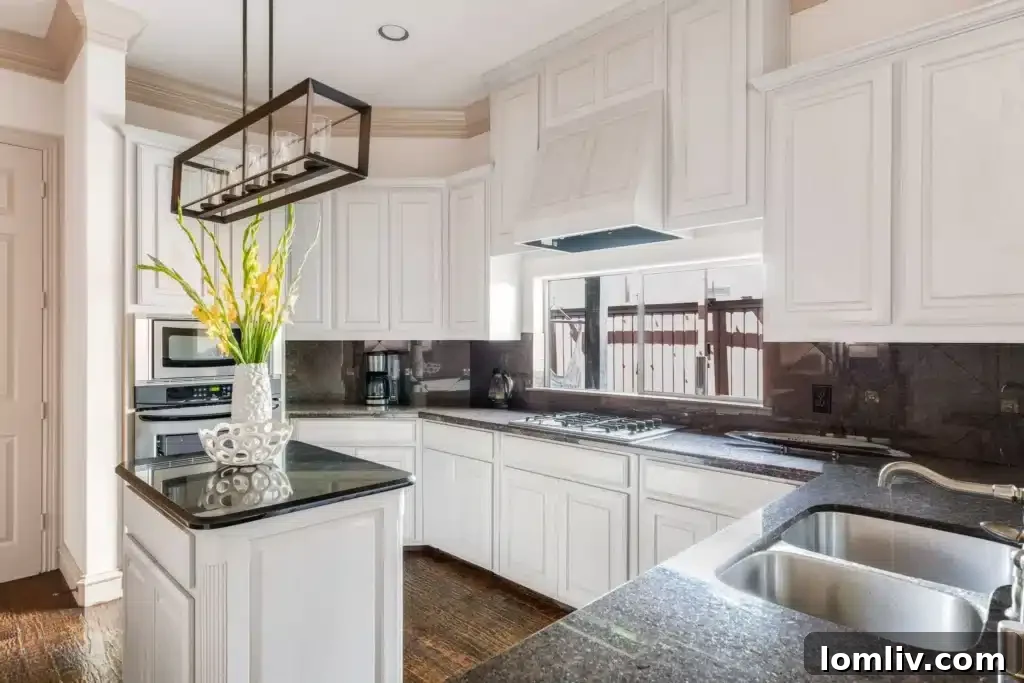 Discover Your Modern Townhome Sanctuary Near Highland Park 7 Open Concept Living and Dining Area with Hardwood Floors