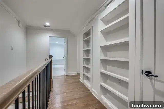 Elegant dual vanity with ample storage in owner's bathroom