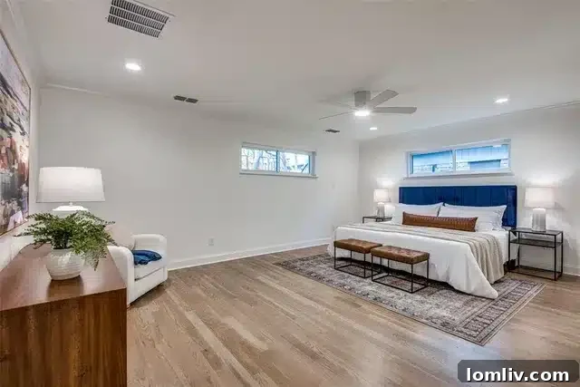 Spa-like owner's bathroom with dual vanity and soaking tub