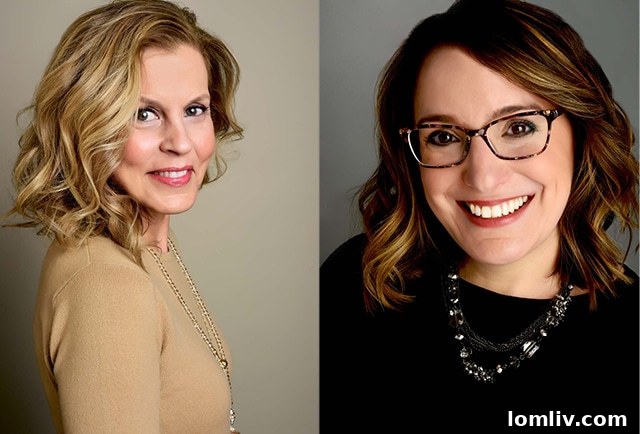 A confident and professionally dressed woman smiling directly at the camera for her headshot