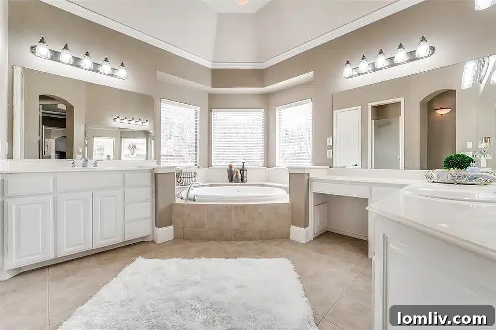 Beautifully landscaped backyard with a large patio, ideal for entertaining.