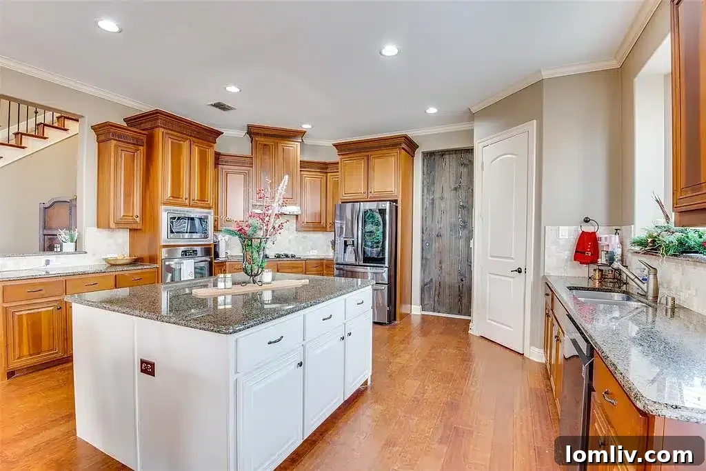 Inviting living room with a grand stone fireplace and high ceilings.
