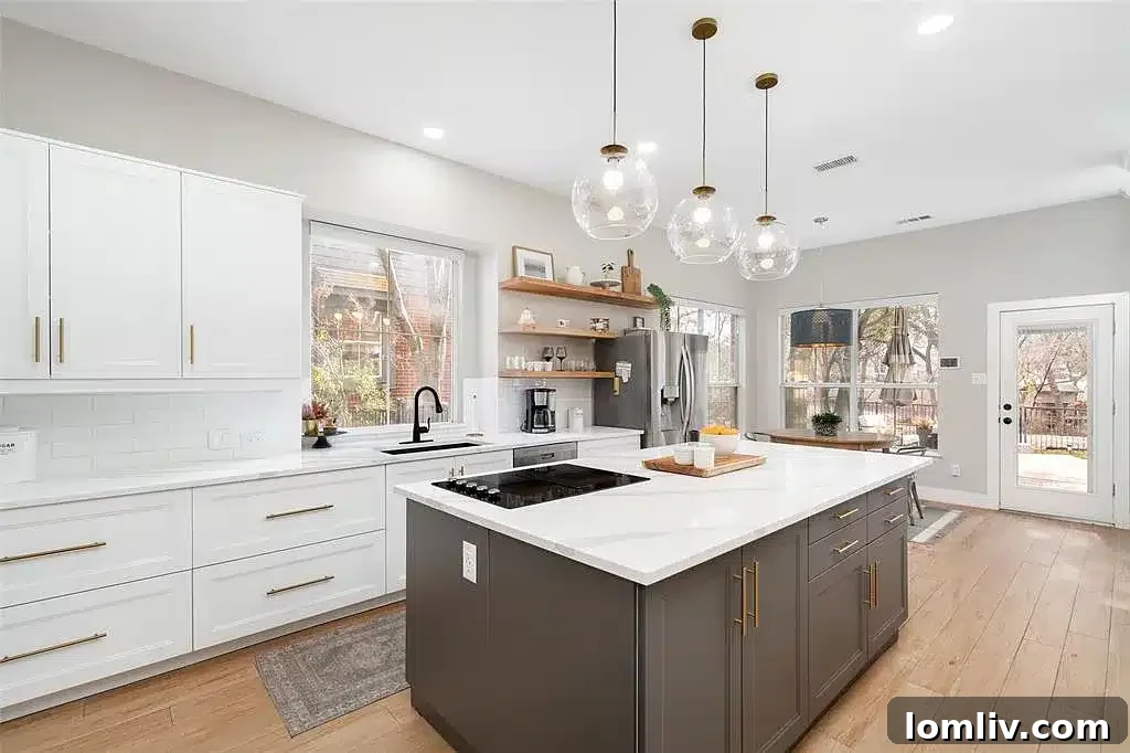 Bright and airy living room with a fireplace, 625 Creek View Drive.