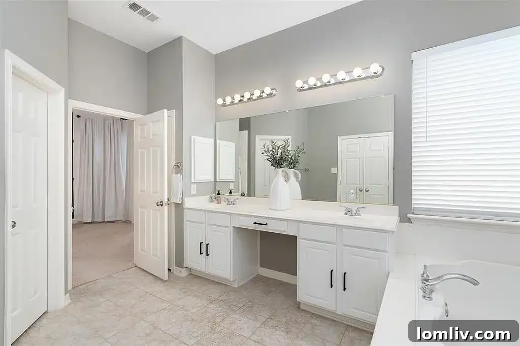 Cozy bedroom with natural light in Prosper home.