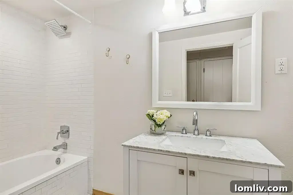 Another view of the primary bathroom, highlighting the walk-in shower.