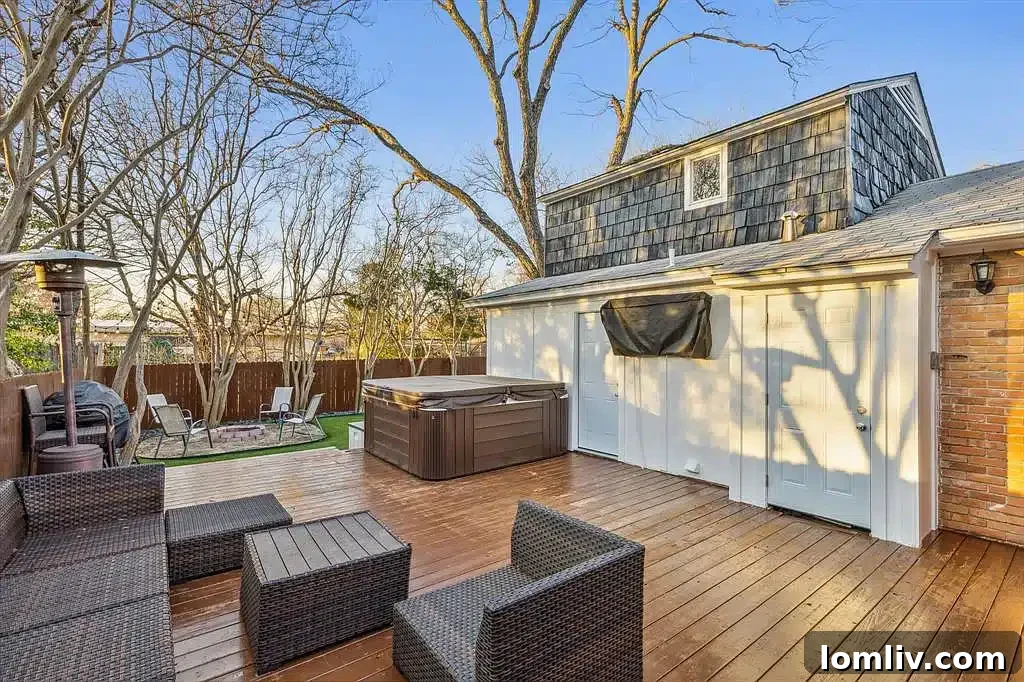 Expansive backyard with a large deck, hot tub, and putting green.