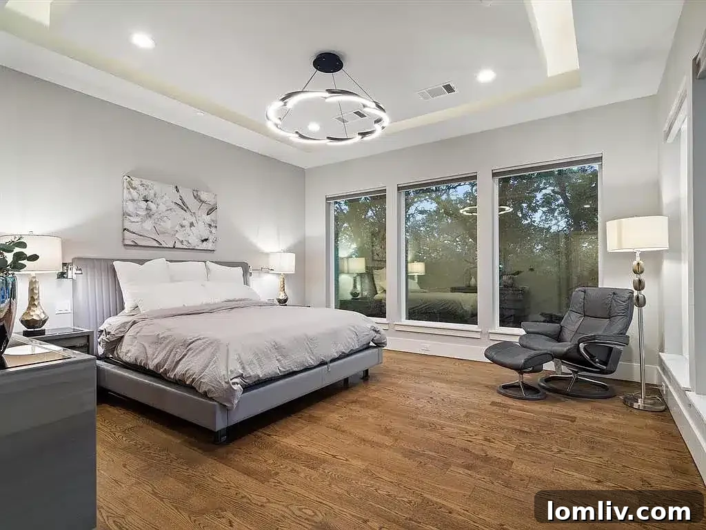 Contemporary bathroom with sleek fixtures and a large walk-in shower, reflecting modern design.