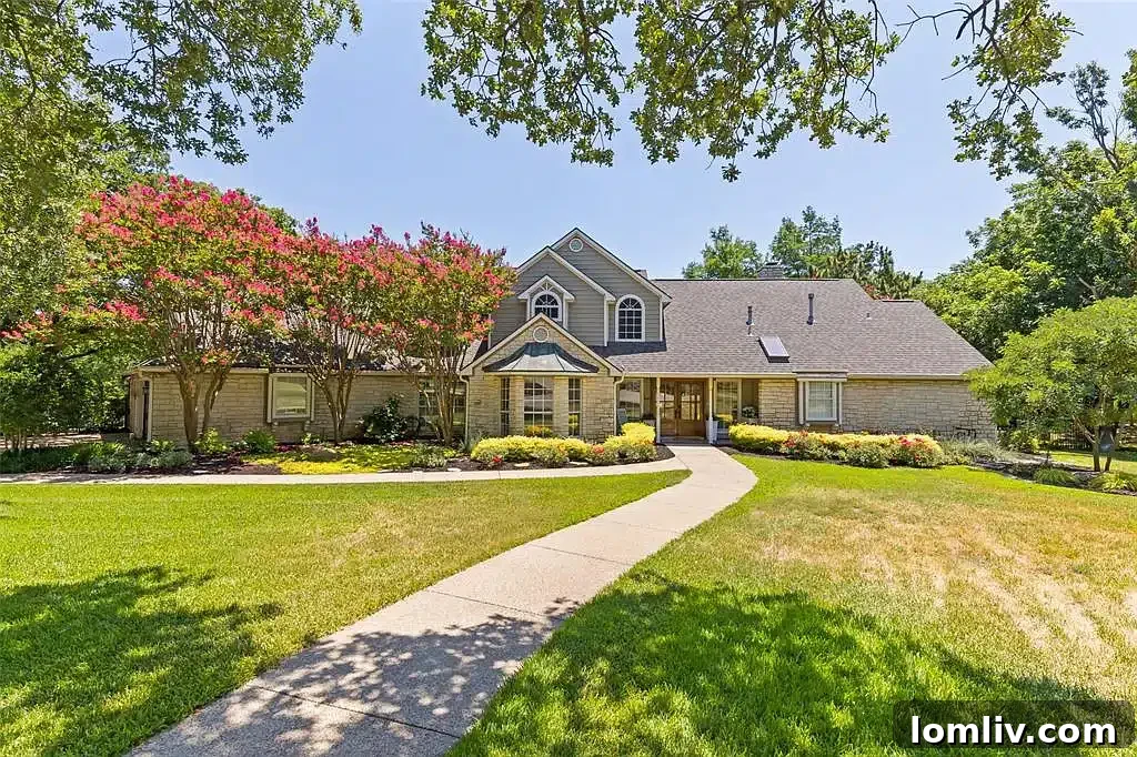 Classic traditional home at 1352 Estella Way in Southlake, featuring a grand entrance and lush green lawns.