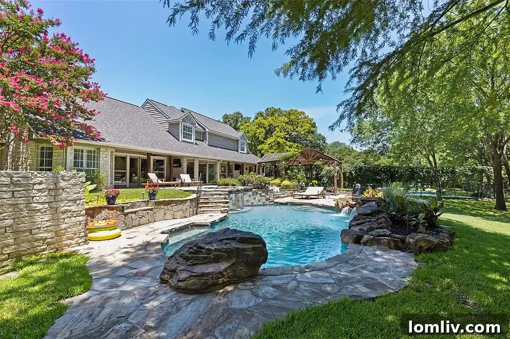 Aerial view of 1352 Estella Way, highlighting the vast 3.4-acre wooded lot and extensive amenities.