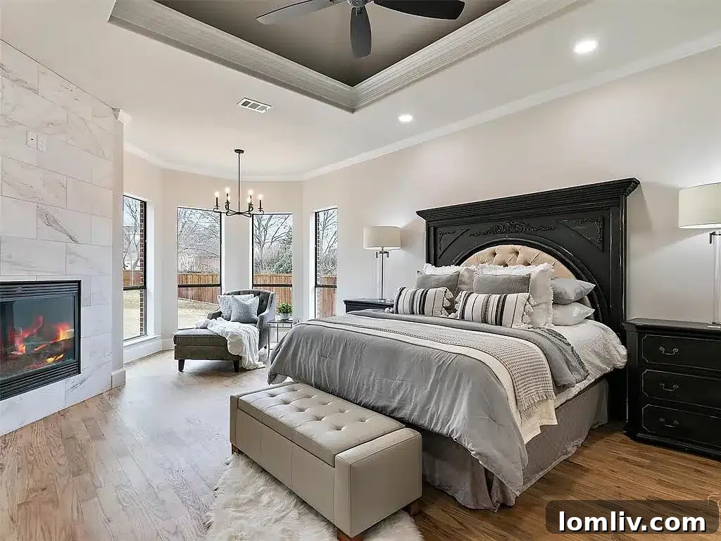 Opulent master bathroom with a freestanding tub, dual vanities, and luxurious finishes.