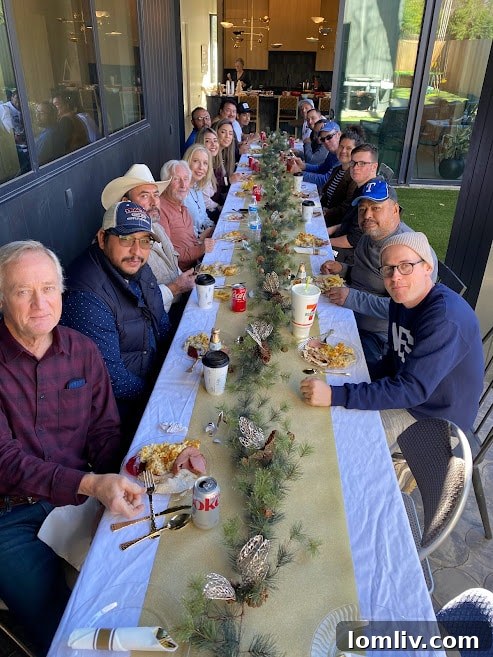 Visitors enjoying an American Thanksgiving meal in the Thurmond backyard.