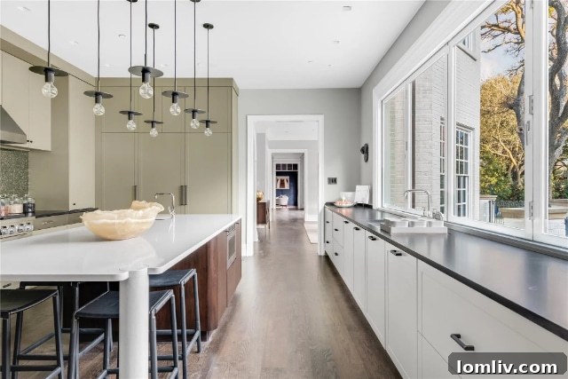 Contemporary Kitchen with Backyard Pool View