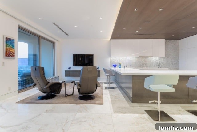 Luxurious dining or living space with custom lighting and refined decor in Unit 16A.