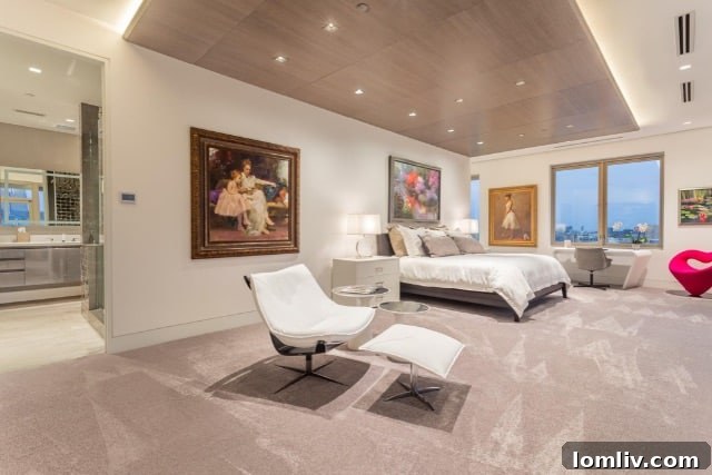 Elegant primary bedroom in The Stoneleigh condo, showcasing breathtaking city views.