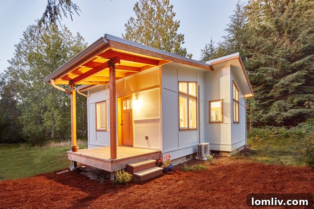 A small, comfortable interior of a tiny home, showcasing a compact living space.