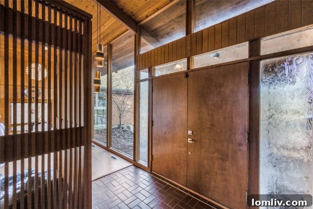 Elegant Midcentury Modern fireplace with stone details