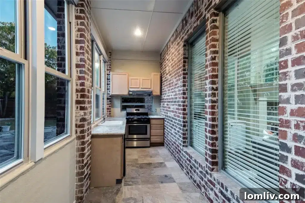 Another perspective of the elegant living area and grand staircase, highlighting the open concept