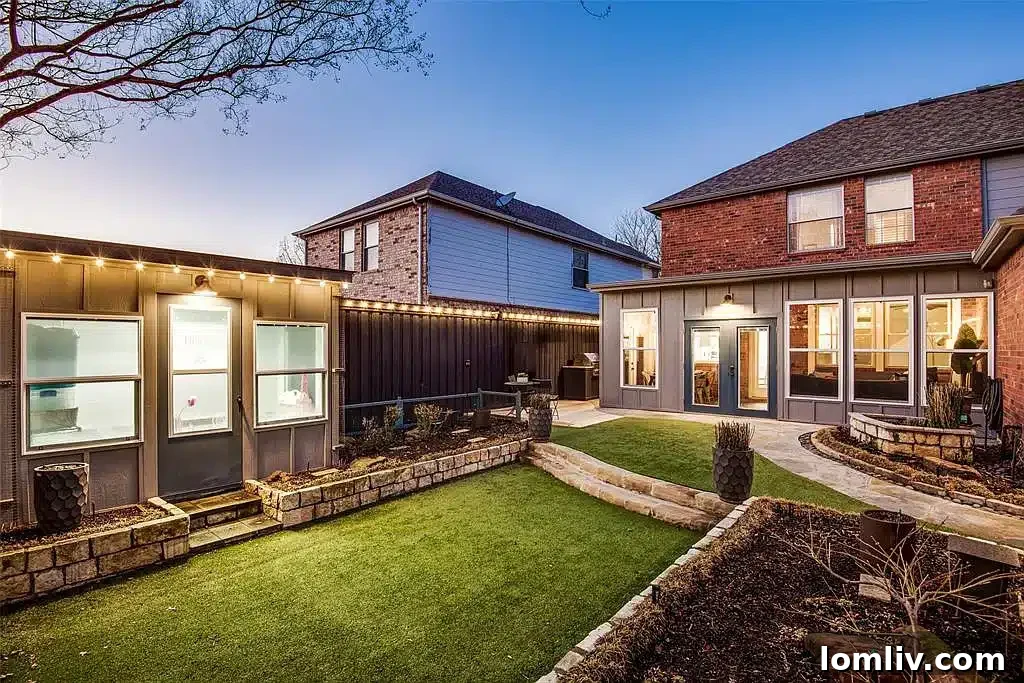 Lush green backyard with mature trees, offering privacy and a serene escape at 1504 Vista Bend Drive