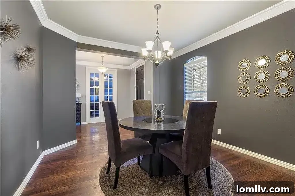 Spacious kitchen with large island, modern fixtures, and ample counter space, ideal for cooking and gathering