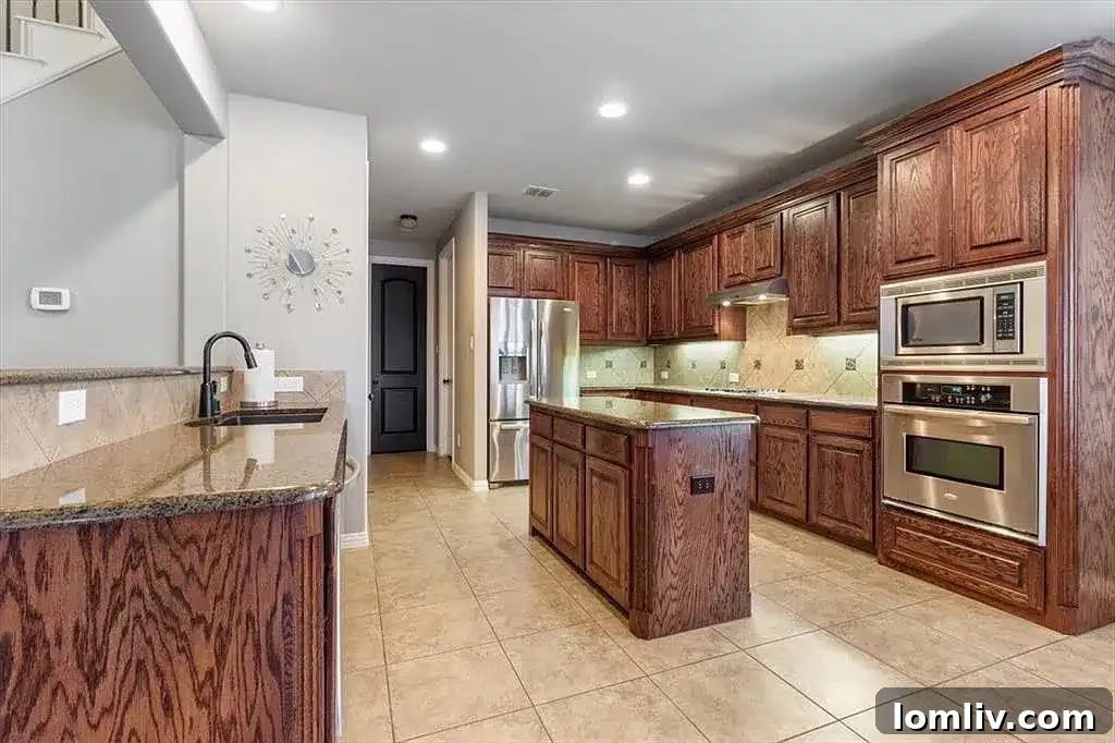 Elegant dining room with chandelier and large window, perfect for formal dinners at 1709 Bear Creek Drive