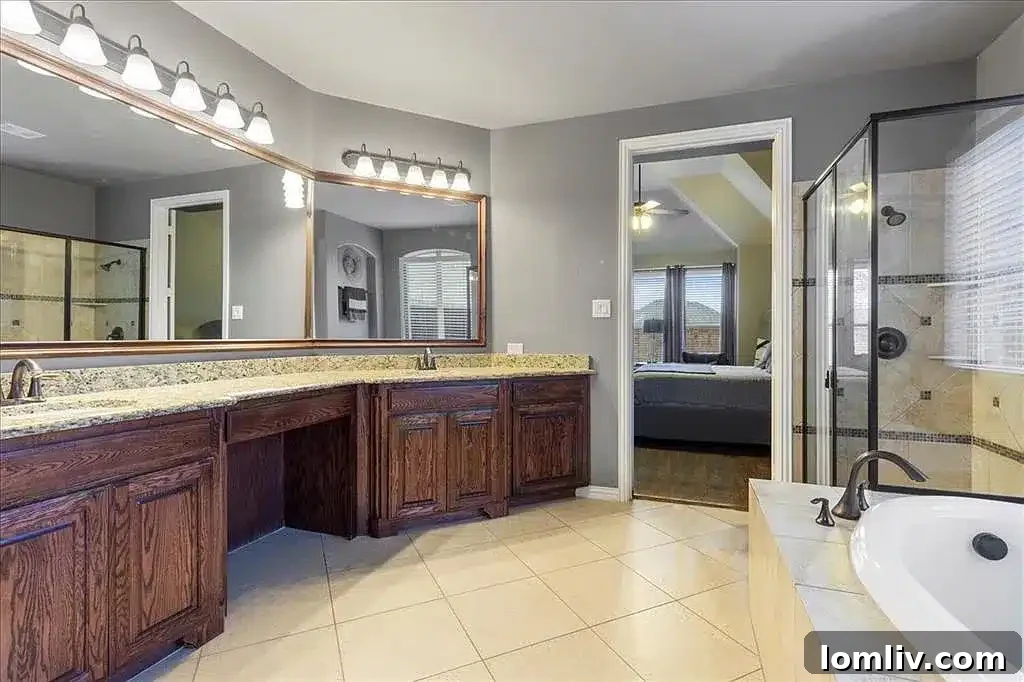 Spa-like master bathroom with large soaking tub, walk-in shower, and double vanity