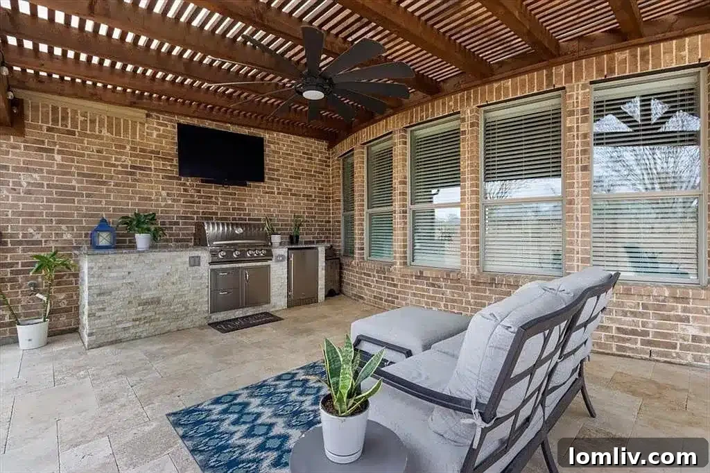 Inviting covered patio overlooking the pool, offering shade and comfort for outdoor living