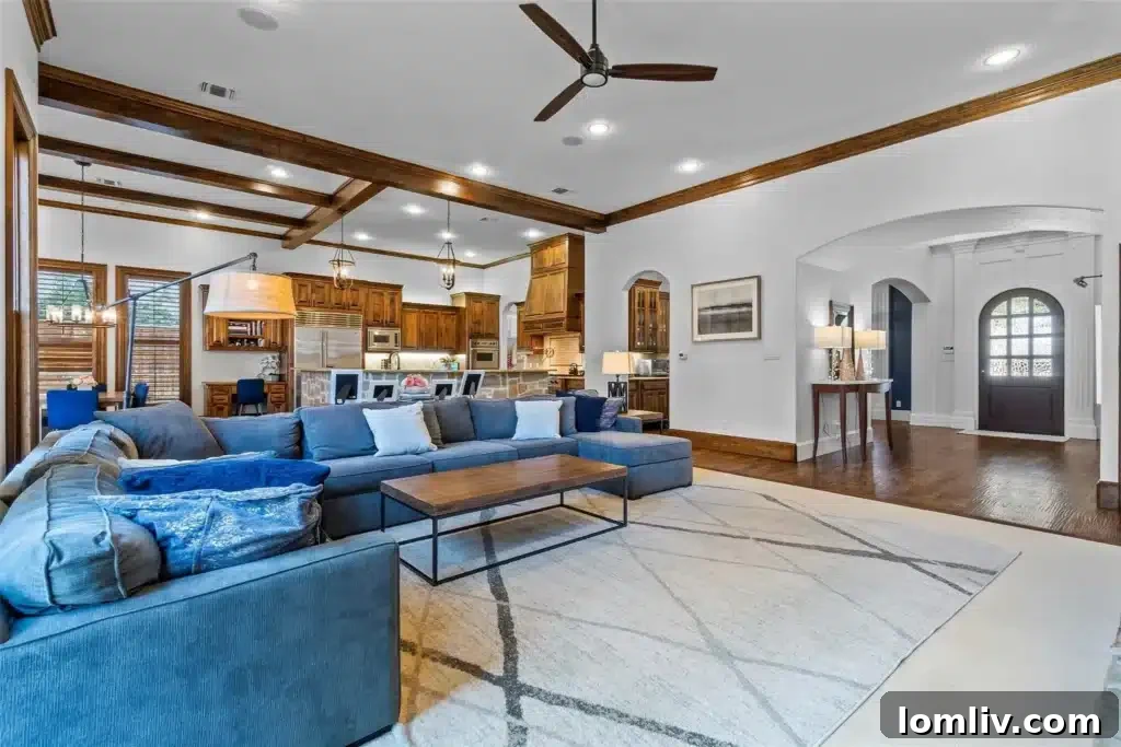 Spacious living area with high ceilings and natural light