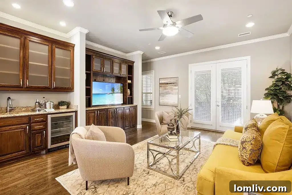 Exterior view of a modern luxury townhome at 5021 Calloway Dr, Addison, TX, featuring contemporary architecture and ample space.