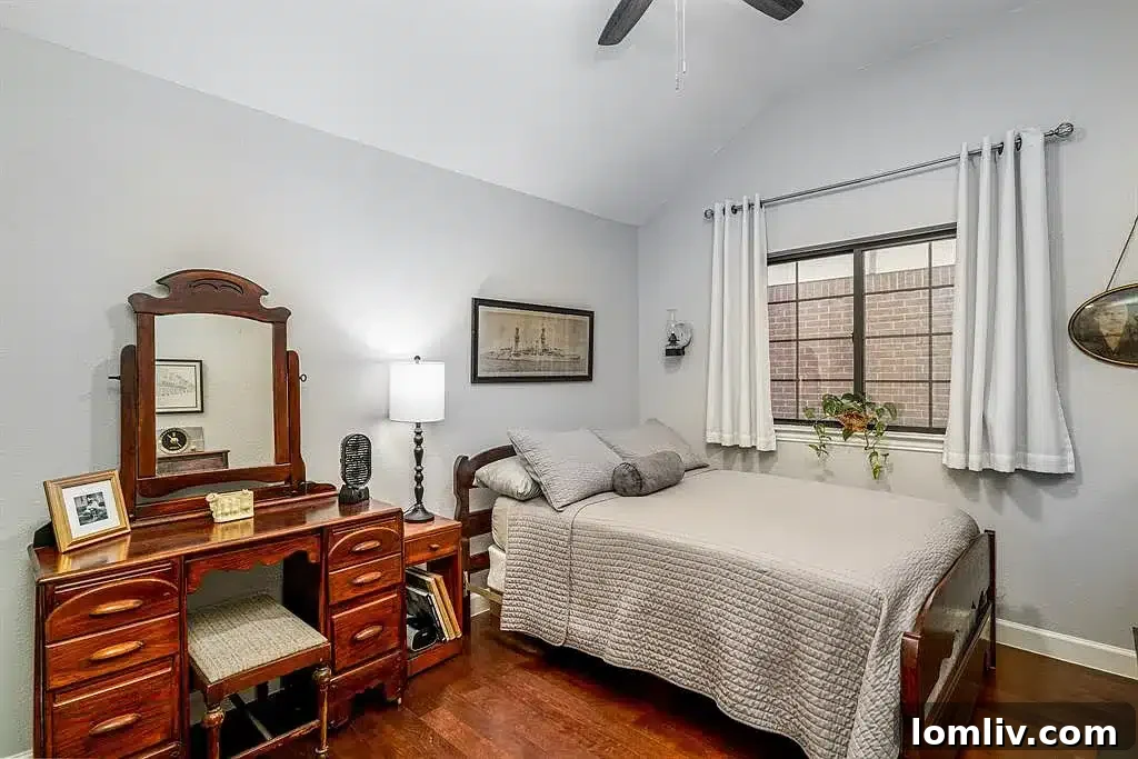 Spacious owner's suite bedroom with ample natural light.