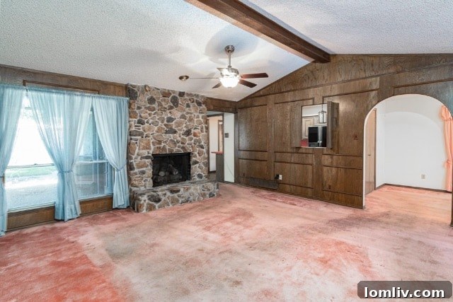 The integrated bifold wood panels that blend with the wall, showcasing clever 1970s design.