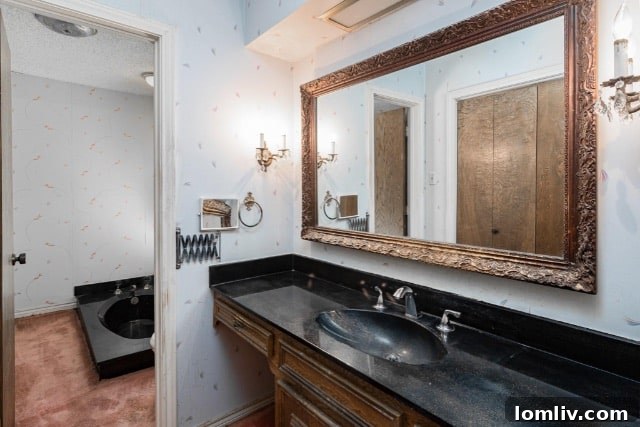 An expansive driveway with alley access, offering significant potential for vehicle storage or development.