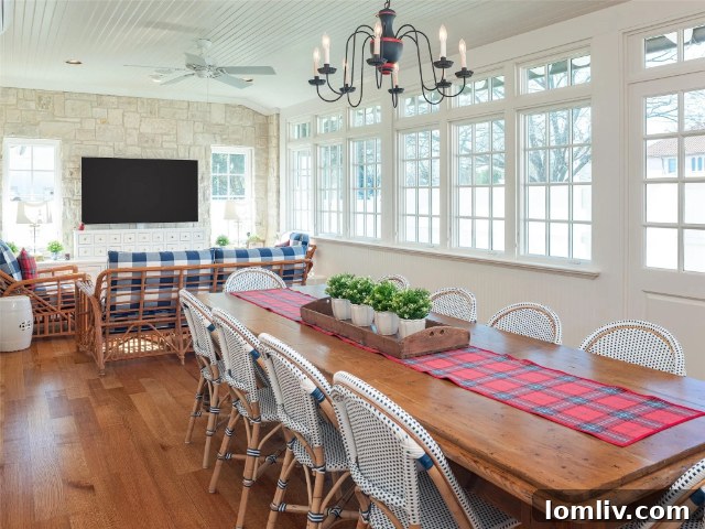Elegant Living Room with Wood Paneling and Stone Fireplace