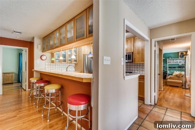 The distinctive roofline and clerestory windows of the Merriman Park home, designed to flood interiors with natural light.